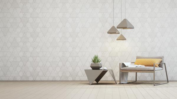室内植物在钢制咖啡桌和扶手椅与空白色三角形图案墙背景
